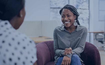 Woman talking to coworker