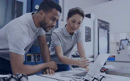 man and woman fixing computer